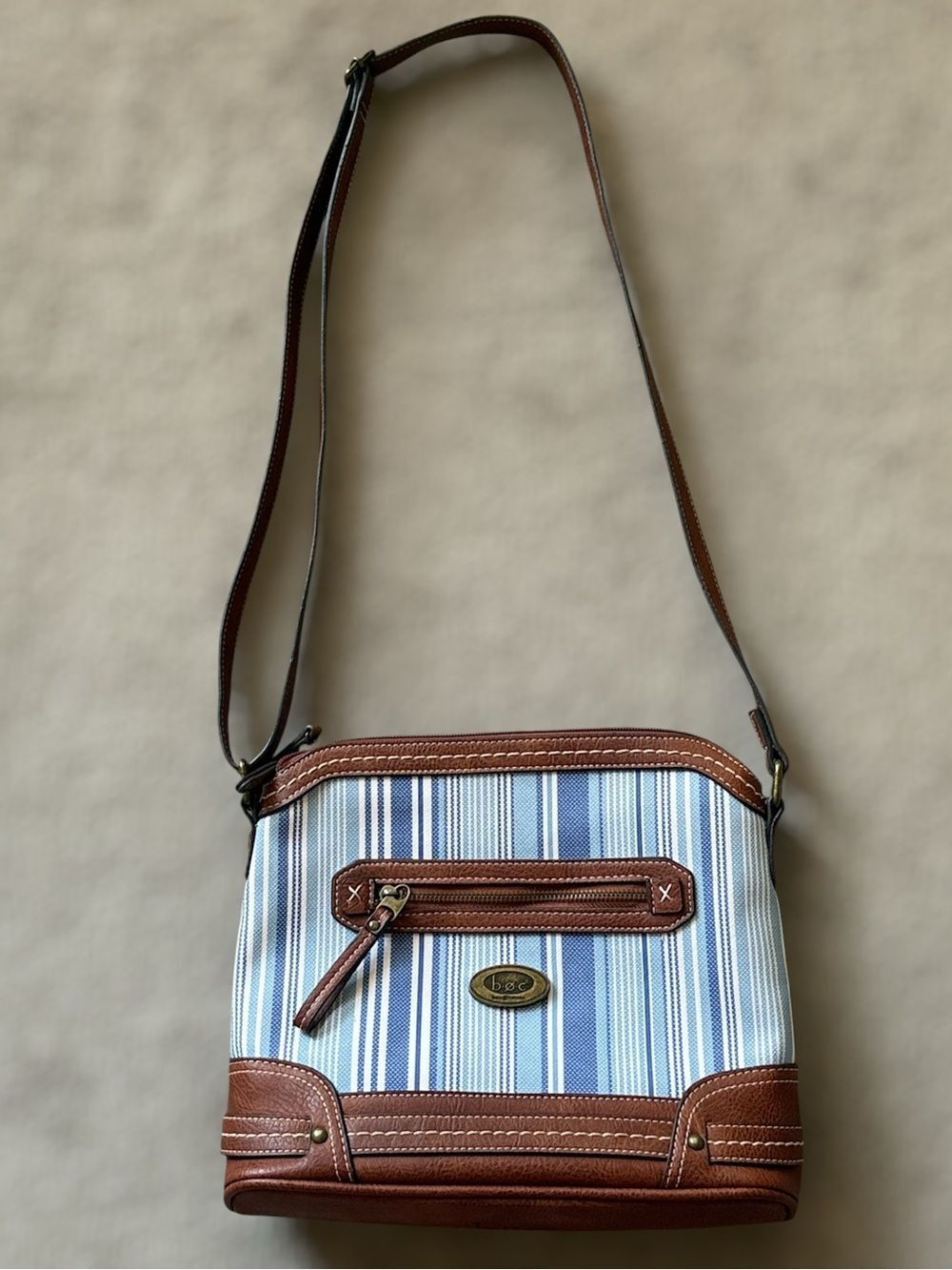 Born Concepts B.O.C
Blue and White Striped Crossbody with Leather Trim!